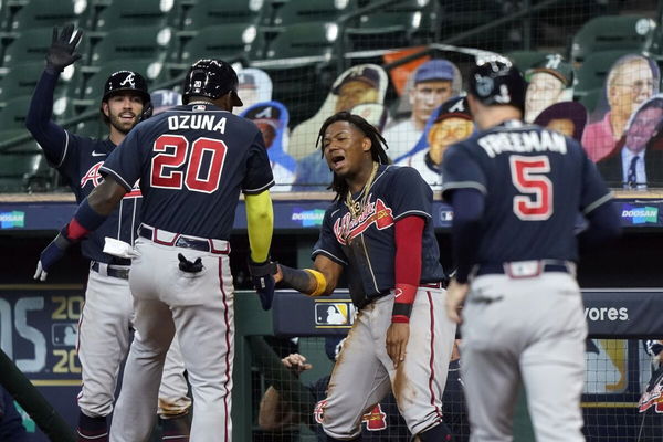 Acuna Jr with teammates FI