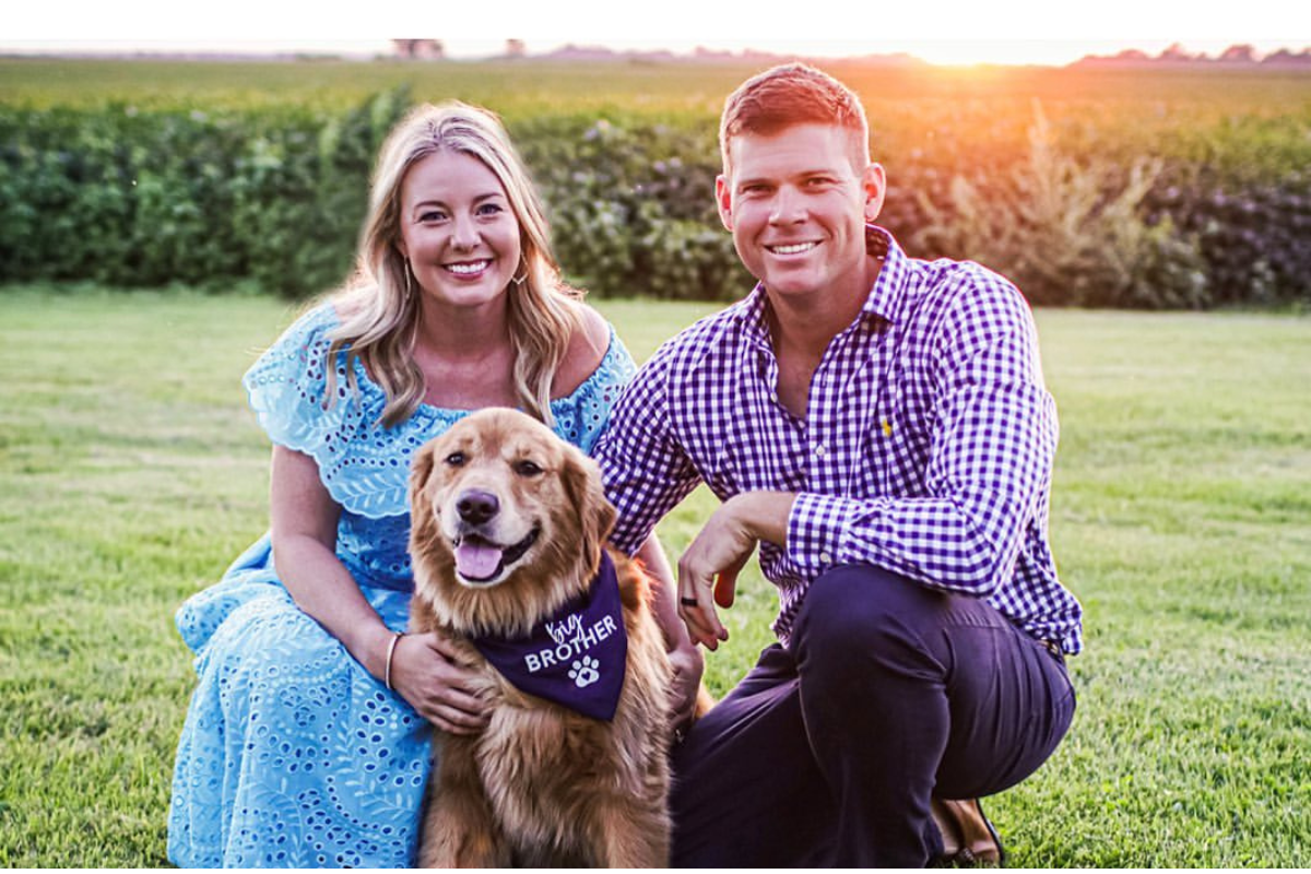 Adam Schenk with Wife and Pet Dog