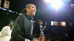 Las Vegas Aces centre A&#8217;ja Wilson (22) receives the 2024 WNBA MVP award prior to playing in a first-round WNBA basketball playoff game against the Seattle Storm