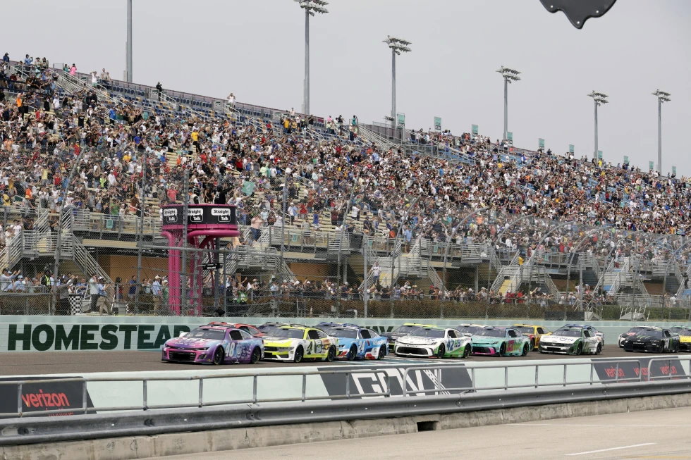Alex Bowman (48) leads the field to start a NASCAR Cup Series auto race at Homestead-Miami Speedway in Homestead, Fla., Sunday, March 23, 2025. (AP Photo/Terry Renna)