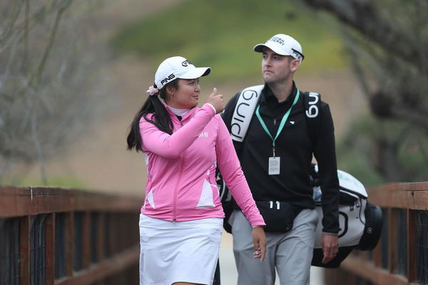 Allisen Corpuz and caddie Jay Monahan