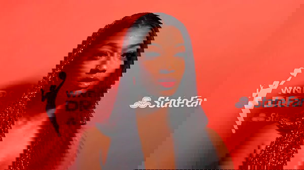 Angel Reese Hooded Silver Gown