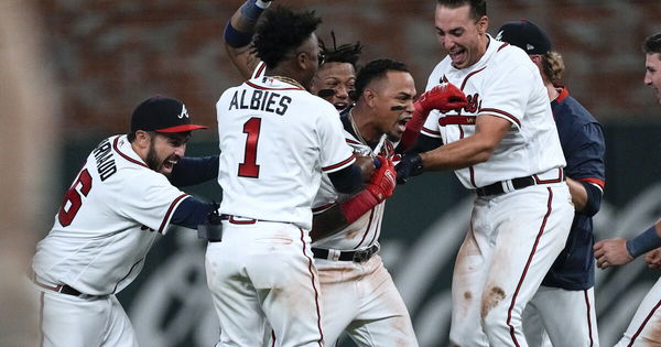 Atlanta Braves&#8217; Orlando Arcia celebrating with teammates