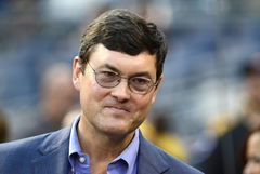Pittsburgh Pirates owner Bob Nutting joins the team on the field before the start of the Milwaukee B