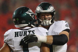 KANSAS CITY, MO &#8211; NOVEMBER 20: Philadelphia Eagles center Cam Jurgens (51) and quarterback Jalen Hurts (1) hug before an