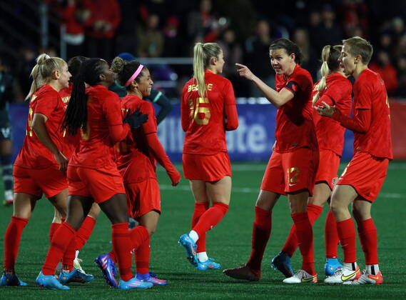 April 11, 2022, LANGFORD, BC, CAN: Canada s Christine Sinclair points to teammates after scoring a goal as they celebrat