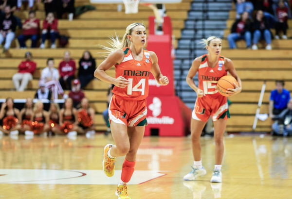 Miami Hurricanes guard Hanna Cavinder (15) and Miami