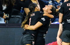 Christen Press and Alyssa Thompson