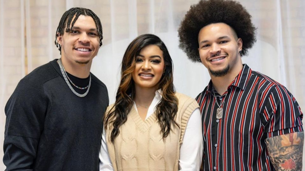 Christian Watson with his sister, Lexi Watson, and brother, Tre Watson Sr. (L-R)