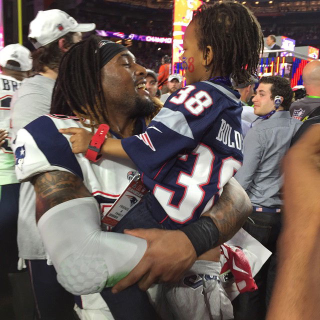 Brandon Bolden with his son 