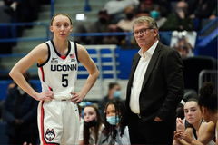 Paige Bueckers and Geno Auriemma
