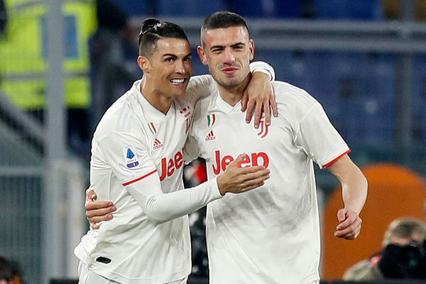 Cristiano Ronaldo and Merih Demiral