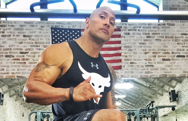 dwayne johnson biceps