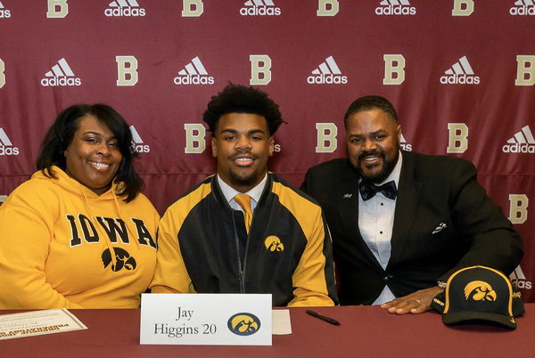 Jay Higgins and his parents