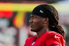 August 8, 2024, Tampa, Florida, USA: Tampa Bay Buccaneers running back Bucky Irving (7) looks on during a break in the a