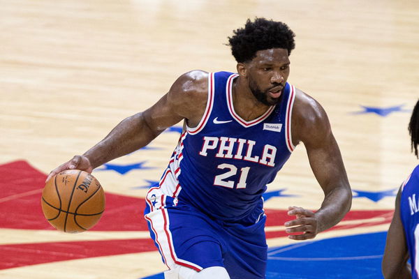 Jan 12, 2021; Philadelphia, Pennsylvania, USA; Philadelphia 76ers center Joel Embiid (21) dribbles against the Miami Heat during the third quarter at Wells Fargo Center. Mandatory Credit: Bill Streicher-Imagn Images