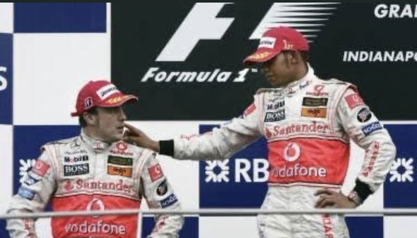 Lewis Hamilton and Fernando Alonso on podium for McLaren