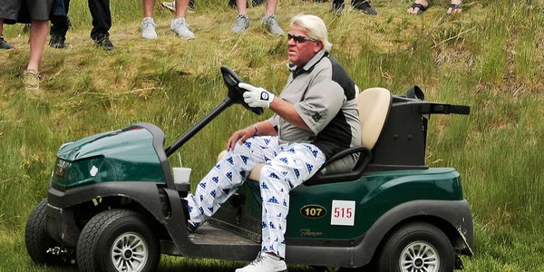 can champions tour players use golf carts