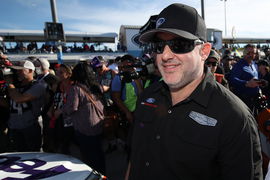 Tony Stewart stands on the grid during the Monster Energy NASCAR Cup Series Ford EcoBoost 400