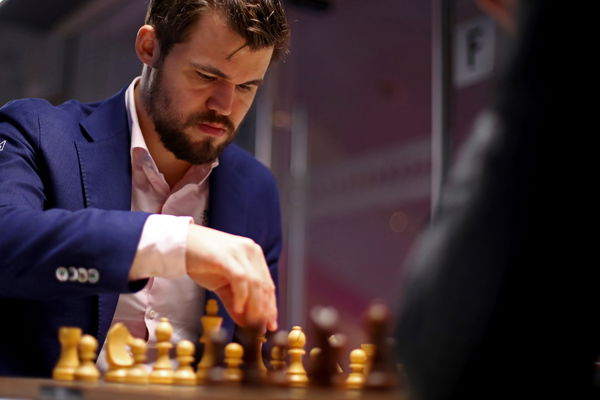 Magnus Carlsen of Norway competes against Daniil Dubov of Russia