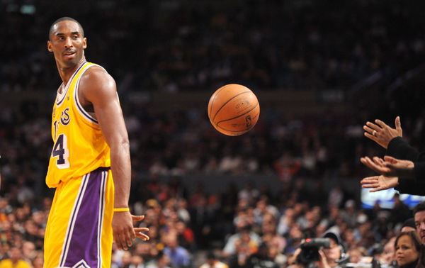 Kobe Bryant Flips a Basketball Toward Spike Lee during a New York Knicks game at Madison Square Garden in 2007