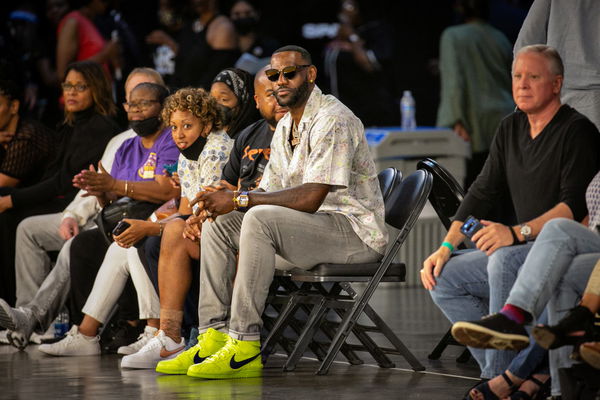 Lebron James attends a Los Angeles Sparks WNBA game