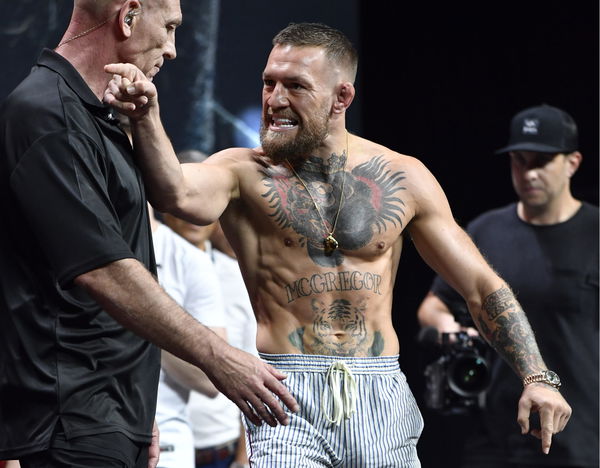 Conor McGregor Claps Back at 50 Cent, You're Old & Have Man Boobs!