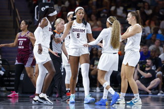 Angel Reese with her teammates