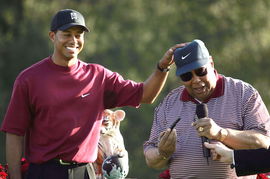 Tiger Woods (L) and Earl Woods (R)