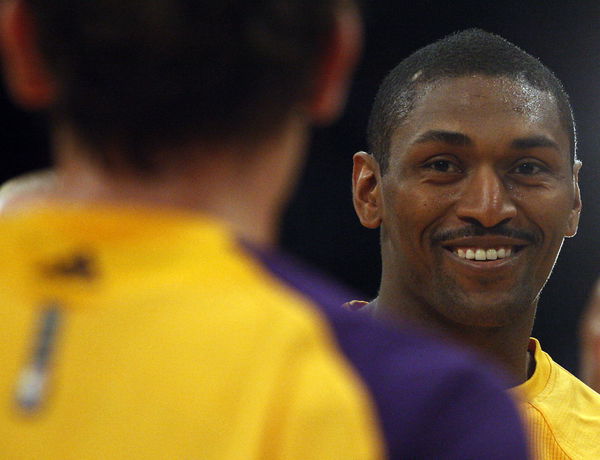 Lakers forward Metta World Peace warms up before a game against the Gokden State Warriors on Friday