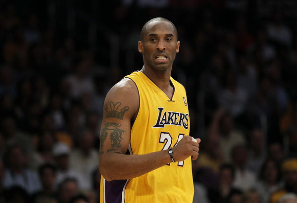 Kobe Bryant grits his teeth during a breeak in play against the Mavericks in game two of the NBA We