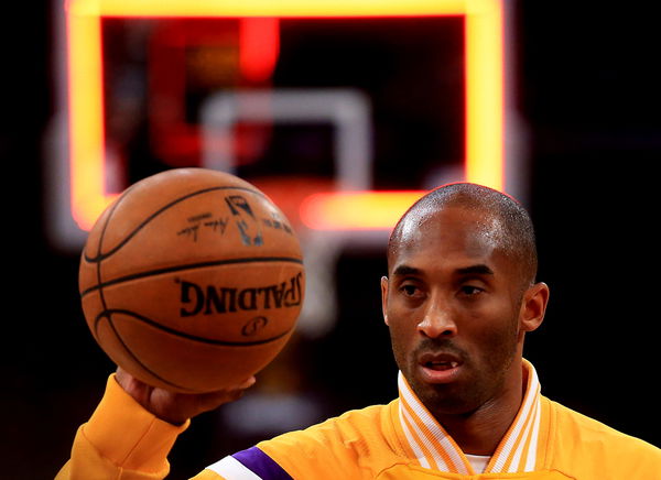 LOLakers guard Kobe Bryant warms up before a game against the Miami Heat