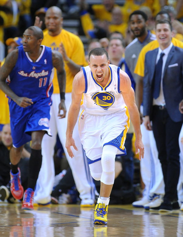 OAKLAND, CALFORNIA APRIL 27, 2014-Warriors Stephen Curry reacts after making a three-pointer agsint