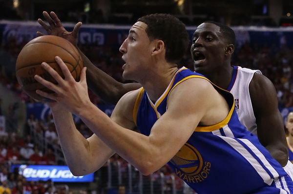 LOS ANGELES, CA, SATURDAY, APRIL 19, 2014 &#8211; Warriors guard Klay Thompson drives past Clippers guard