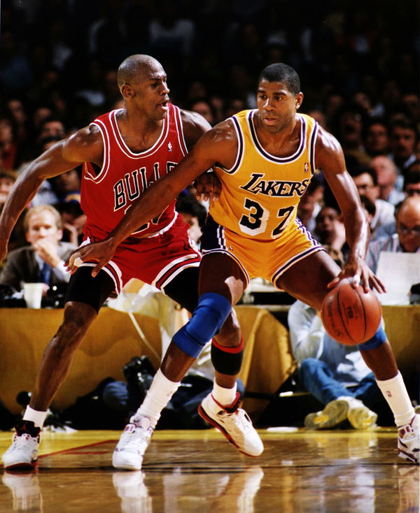 LOS ANGELES, CA Spring, 1991 ?? Los Angeles Lakers Magic Johnson, right, is guarded by Michael Jordan