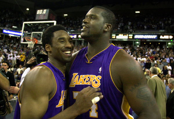 29609.SP.0513.lakers9.WS Lakers Kobe Bryant, left, celebrates his 48?points with Shaquille O&#8217;Neal af