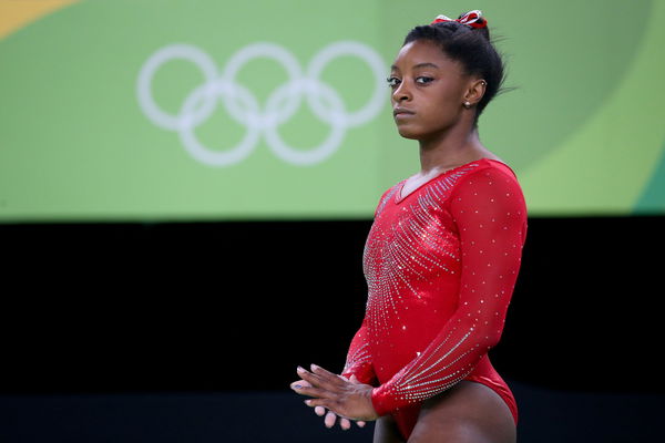 Watch tiny gymnast Simone Biles scale a giant rope