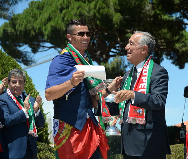 (160712) &#8212; LISBON, July 12, 2016 () &#8212; Portuguese President Marcelo Rebelo de Sousa (R) greets Cristiano Ronaldo of during a celebrating reception for the Euro 2016 football championship at the Presidential Palace in Lisbon, Portugal, July 11, 2016. (Xinh