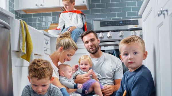 Joe Flacco with his wife and children