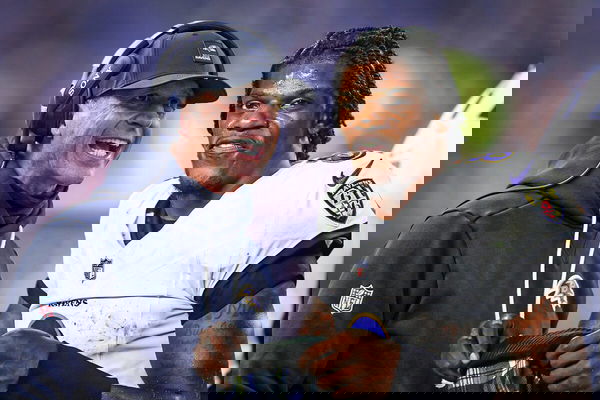 John Harbaugh and Lamar Jackson