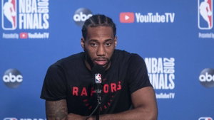Kawhi Leonard addressing the press