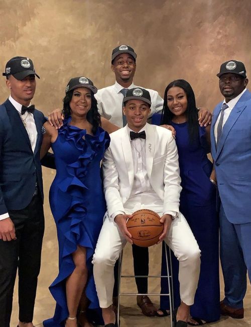 Keldon Johnson with his parents and siblings