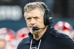 Kyle Whittingham , Doug Elisaia