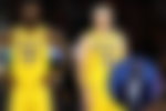 Lebron James, Austin Reaves and James Worthy