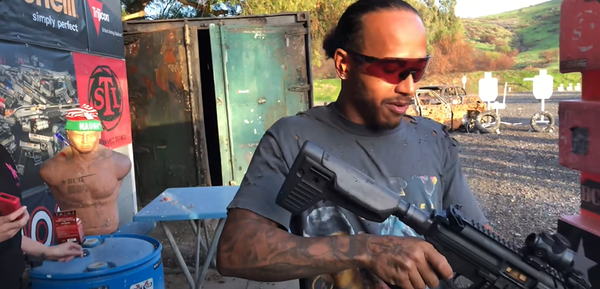 Lewis Hamilton at Taran Tactical with an Assault Rifle