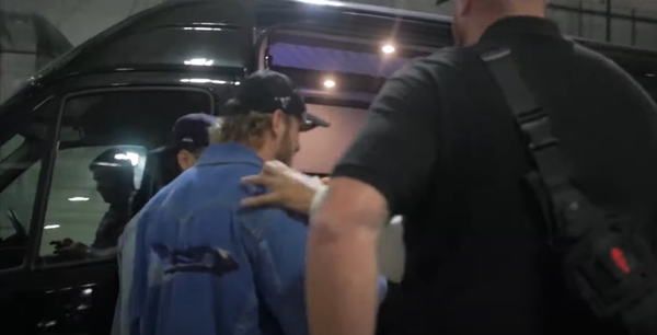 Logan Paul runs from Hasim Rahman Jr.