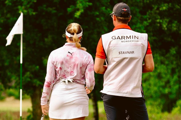 Madelen Stavnar and caddie