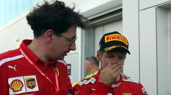 Sebastian Vettel and Mattia Binotto