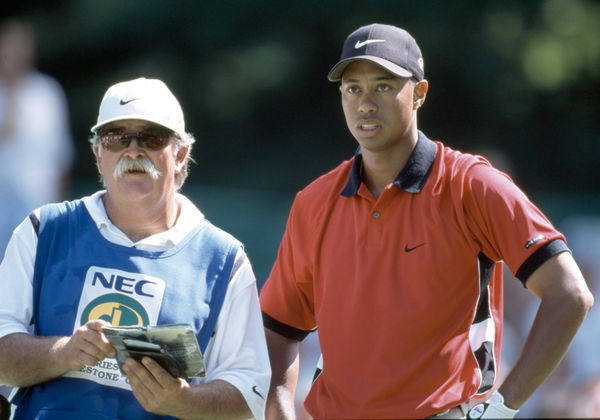 https://image-cdn.essentiallysports.com/wp-content/uploads/Mike-Cowan-Tiger-Woods.jpeg