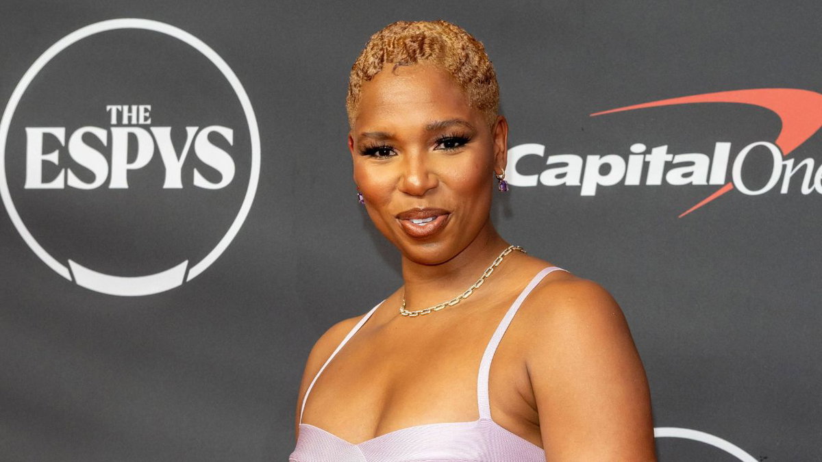 ESPN’s Monica McNutt Reveals Why She’s Still “Mystified” by Viral Taylor Swift Hot Mic Moment During Knicks’ Finals Run